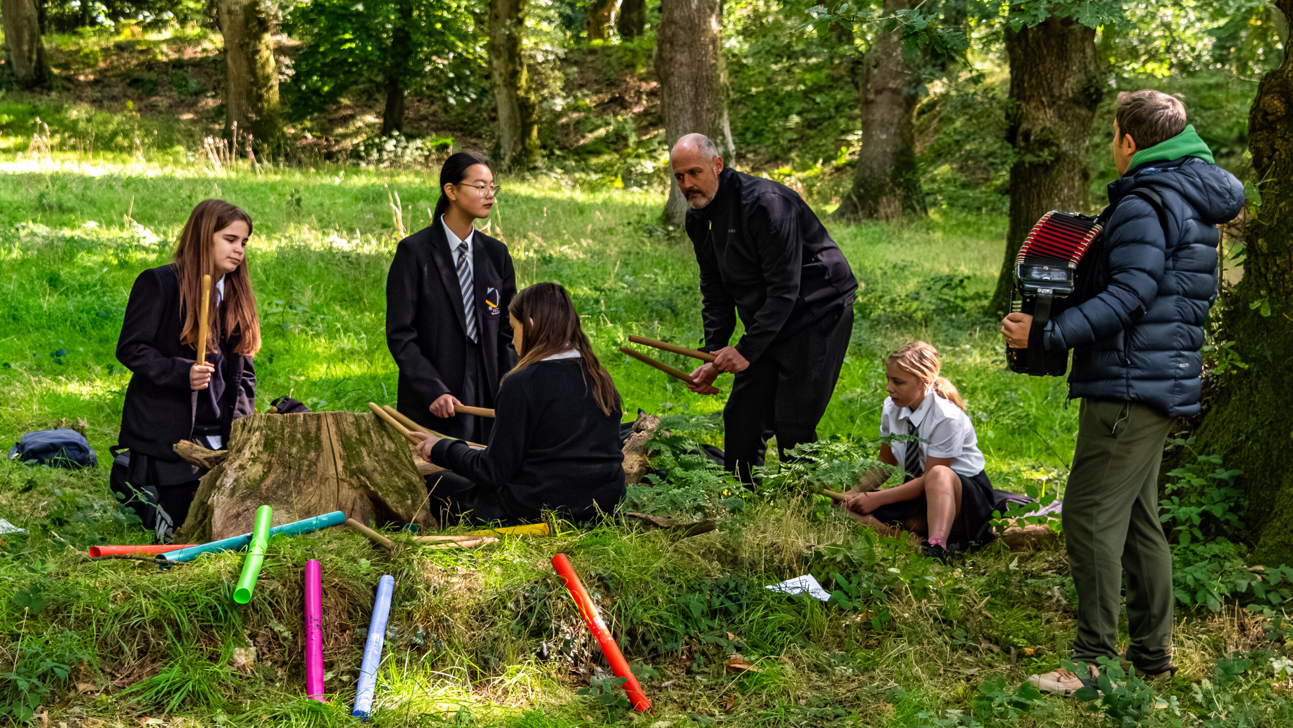 Year 8 students from Honiton Community College taking part in a workshop at Blackbury Camp.